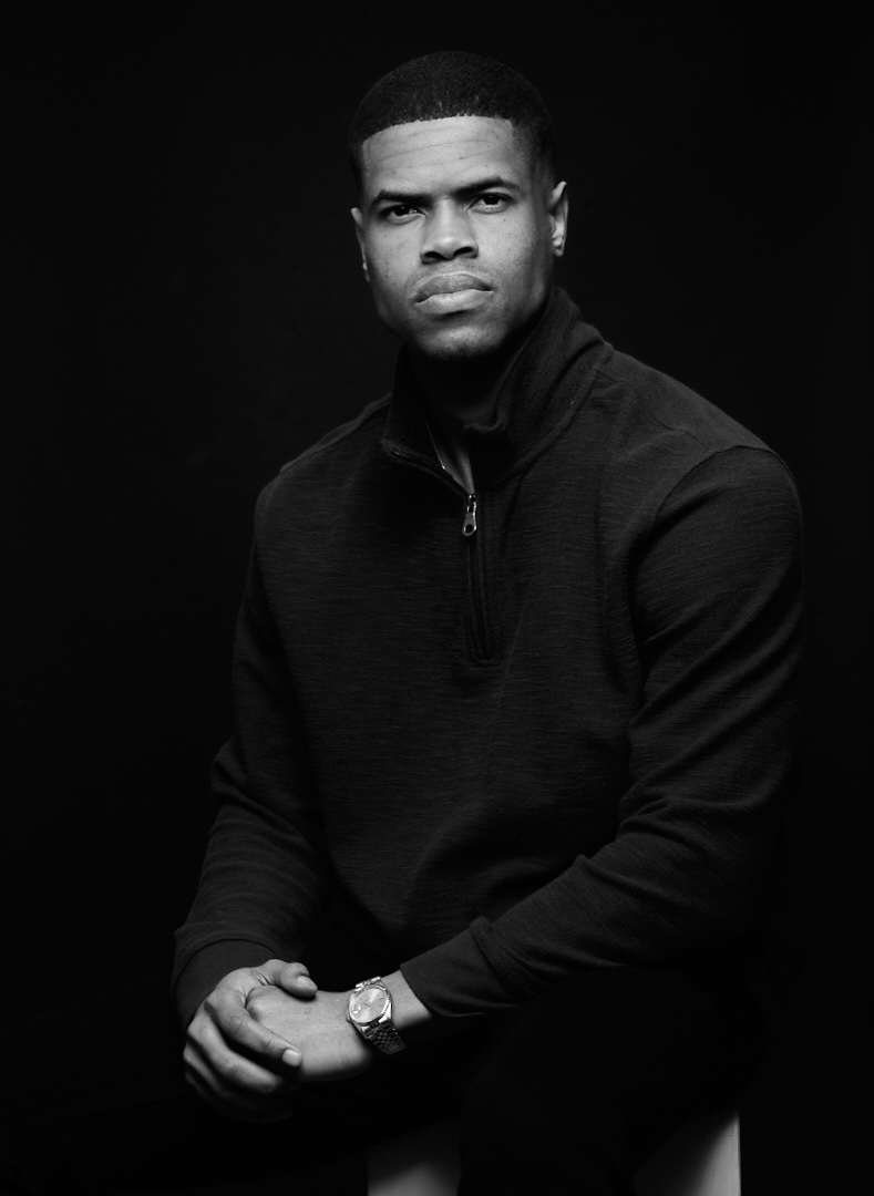 Serious black-and-white portrait of Phil Wright